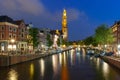 Night Amsterdam canal and Westerkerk church Royalty Free Stock Photo