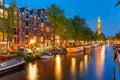 Night Amsterdam canal and Westerkerk church Royalty Free Stock Photo