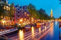 Night Amsterdam canal and Westerkerk church Royalty Free Stock Photo