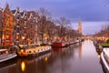 Night Amsterdam canal and Westerkerk church Royalty Free Stock Photo