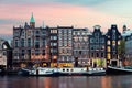 Night Amsterdam city view of Netherlands traditional houses with