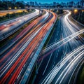 Night autobahn lights from cars against the city