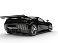 Night black modern race super car - back side view Royalty Free Stock Photo