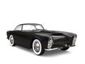 Night black vintage muscle car with white wall tires