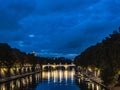 Night on bridge Giuseppe Mazzini and the Fiume Tevere river in Rome Italy