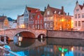 Night Bruges canal and bridge, Belgium Royalty Free Stock Photo