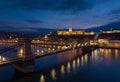 Night Buda Castle and Szechenyi Chain Bridge in Budapest, Hungary. Danube River Royalty Free Stock Photo