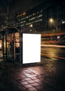 Night bus station with blank billboard Royalty Free Stock Photo