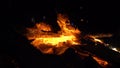 Night campfire, fire in nature, beautiful play of fire and an abundance of different colors