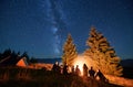 Night camping in mountains under starry sky with Milky way. Royalty Free Stock Photo