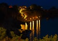 Night capture of stairs leading to sea.Lighted stairway to sea on hillside night, a bay of Crete, Greece