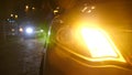 Night. car blinker light. emergency car warning light on the background of moving cars on a night road. Royalty Free Stock Photo