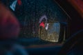 night car driving rain drops on window Royalty Free Stock Photo