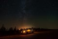 Night car trip night under star sky. night driving travel. milky way above highway Royalty Free Stock Photo