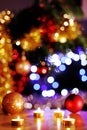 christmastime spirit background Eve golden candles with the glittering lights Royalty Free Stock Photo