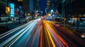 The night city comes alive with vibrant light trails, capturing the dynamic urban motion.