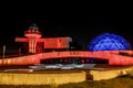 Night city landscape planetarium Tereshkova with multi-colored lighting and futuristic design