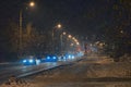 Night city landscape with street lights and urban traffic Royalty Free Stock Photo