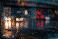 Night city life through windshield: cars, lights and rain Royalty Free Stock Photo