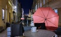 Night  city light  pink umbrella  rainy season street    old town of Tallinn panorama blurring bokeh cup of coffee on table people Royalty Free Stock Photo