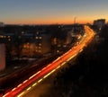 Night city light traffic in window frame , orange sunset building urban panorama Tallinn Estonia Royalty Free Stock Photo