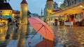 Night City Lights Rainy Season weather  Autumn evening in city street bokeh light  rainy night  umbrella Royalty Free Stock Photo