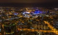 night city with lights skyscrapers and roads, view from drone