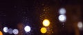 Night city, neon lights, blurred bokeh background, raindrops. Night view. Royalty Free Stock Photo