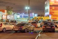 Night city scene, street photos, cars in the parking lot, foreign cars.