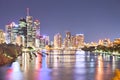 Night city sky with illuminating bright and long buildings