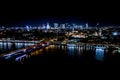 Night city skyline background. Aerial view of Warsaw capital city of Poland. From above, night city view with night sky. Night Royalty Free Stock Photo