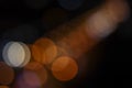 Night city street in defocus. Dark background with circles of light. Copy space Royalty Free Stock Photo