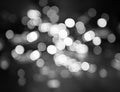 Night city street lights bokeh background, black and white Royalty Free Stock Photo