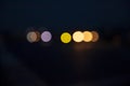 Night city street traffic abstract blurry bokeh lights background Royalty Free Stock Photo