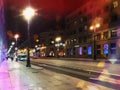 Saint Petersburg night city streets ,people walk ,evening light blurred ,house with dark windows vitrines ,cityscape ,holiday trav Royalty Free Stock Photo