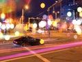 Night city traffic cars on road and street neon light blurred on  buildings urban lifestyle Royalty Free Stock Photo