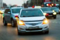 Evening city traffic in a giant metropolis.City light bokeh background.Defocused night traffic lights. Royalty Free Stock Photo