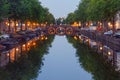 Night city view of Amsterdam canal and bridge Royalty Free Stock Photo