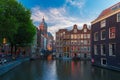 Night city view of Amsterdam canal, church and bridge Royalty Free Stock Photo