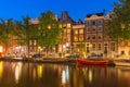 Night city view of Amsterdam canal with dutch Royalty Free Stock Photo