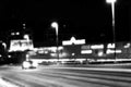 Night city view in blur. City Speed Traffic blurry photo. Street life bokeh image. Street view with traffic and cars defocused ima Royalty Free Stock Photo