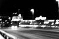 Night city view in blur. City Speed Traffic lights blurry photo. Street life bokeh image. Street with traffic and cars defocused i Royalty Free Stock Photo