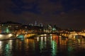 Night city view of the river Seine and bridges in Paris Royalty Free Stock Photo