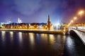 Night cityscape, Moscow Kremlin, Basil`s Descent and Red Square, embankment, street lights at evening winter snowfall. Royalty Free Stock Photo