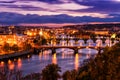 Night cityscape of Prague historical architecture and famous bridges