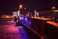 Night cityscape with river and bridge in Saint-Petersburg. Lantern lights on bridge Royalty Free Stock Photo