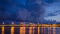 Night cityscape with river and bridge in Saint-Petersburg.