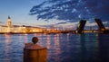 Night cityscape with river and bridge in Saint-Petersburg. Royalty Free Stock Photo