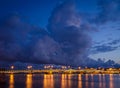 Night cityscape with river and bridge in Saint-Petersburg. Royalty Free Stock Photo