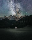 Night clear sky with Milky way and stars over Church St. Johann in Ranui, Dolomites Royalty Free Stock Photo